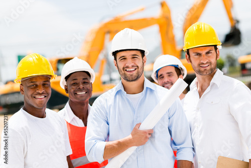 Photo: Group of men at a construction site Group of men at a construction site