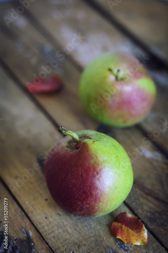 Photo: Ripe delicious apples on wooden table Ripe delicious apples on wooden table