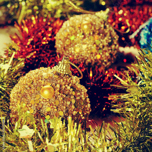 Photo: christmas balls and tinsel christmas balls and tinsel