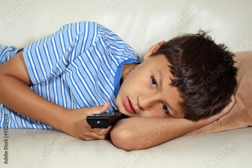Photo: Young boy watching TV Young boy watching TV