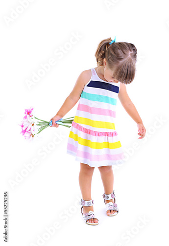 Photo: Little cute girl holding flowers, isolated on white Little cute girl holding flowers, isolated on white