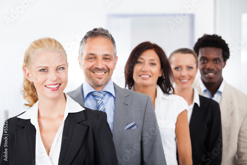 Photo: Happy Multiracial Businesspeople Happy Multiracial Businesspeople