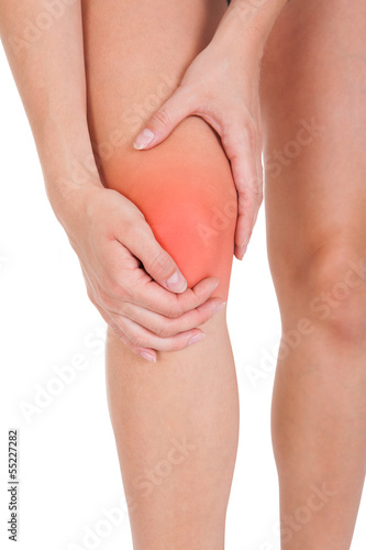 Photo: Woman having leg injury Woman having leg injury