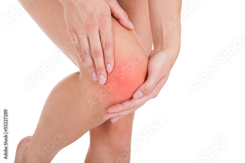 Photo: Woman having leg injury Woman having leg injury