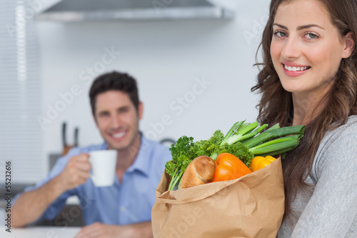 Photo: Woman with groceries bag Woman with groceries bag