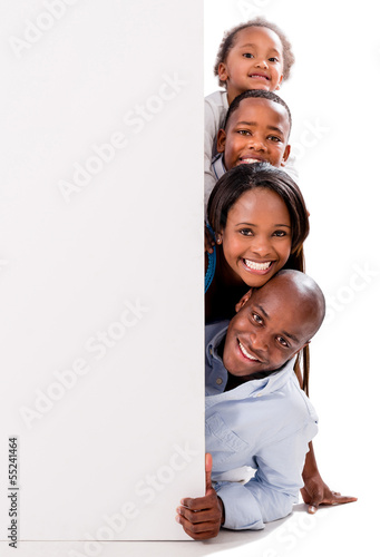 Photo: Happy family with a banner Happy family with a banner