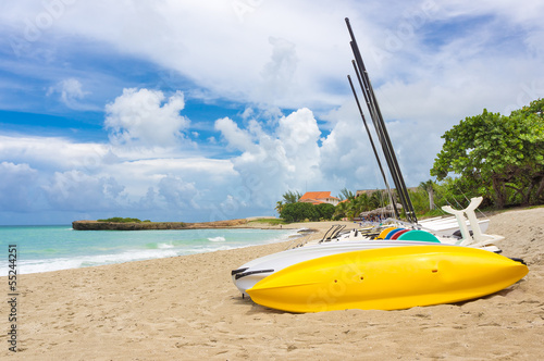 Photo: Kayaks and catamarans at Varadero beach in Cuba Kayaks and catamarans at Varadero beach in Cuba
