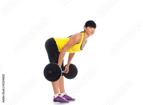Photo: Beautiful fitness girl liftings weights Beautiful fitness girl liftings weights