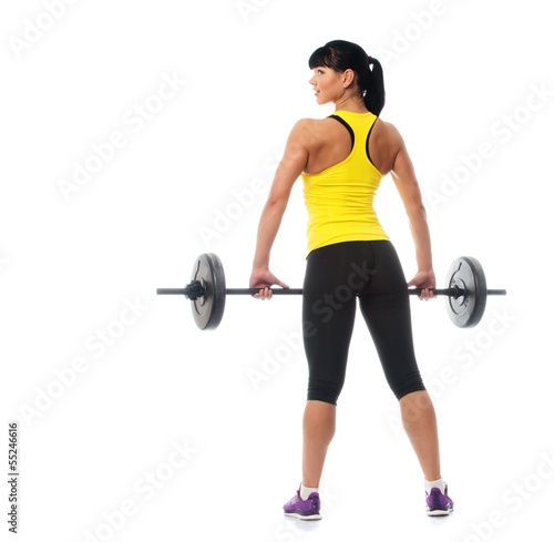 Photo: Beautiful fitness girl liftings weights Beautiful fitness girl liftings weights