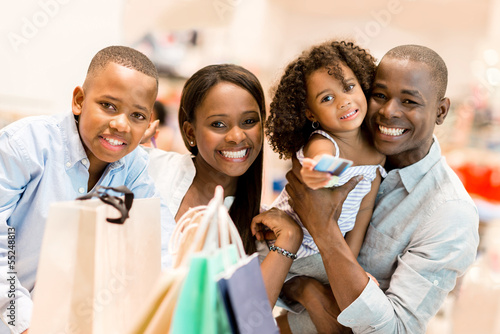 Photo: Happy family shopping Happy family shopping