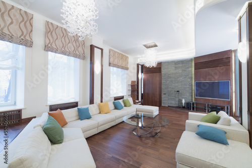 Photo: The spacious, well lit living room The spacious, well lit living room