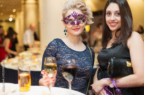 Photo: Two young woman on costume party Two young woman on costume party