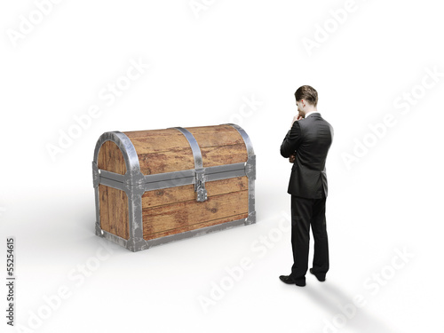 Photo: man looking at chest man looking at chest
