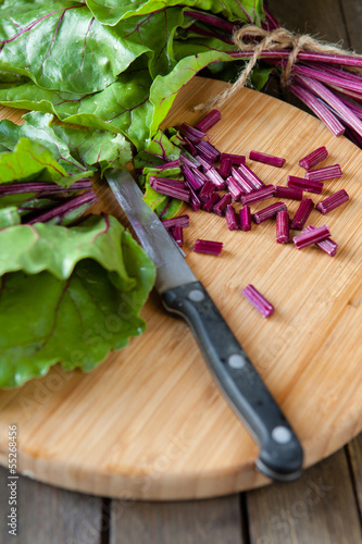 Photo: fresh leaves of chard and a knife fresh leaves of chard and a knife