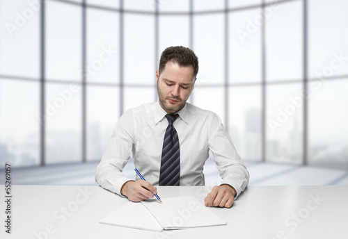 Photo: businessman writing businessman writing