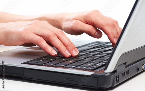 Photo: Hands with laptop computer. Hands with laptop computer.