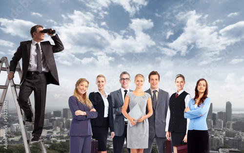 Photo: Businessman with binoculars. Businessman with binoculars.