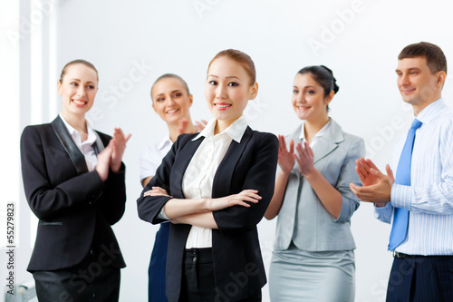 Photo: Asian business woman with colleagues Asian business woman with colleagues
