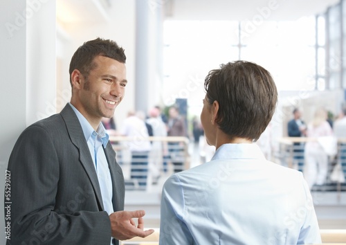 Photo: Businesspeople talking outdoors Businesspeople talking outdoors