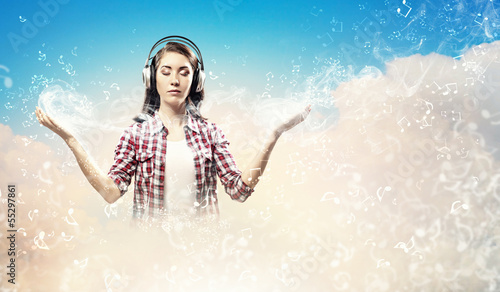 Photo: Young woman with headphones Young woman with headphones