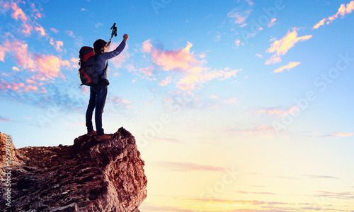 Photo: Young tourist atop of mountain Young tourist atop of mountain