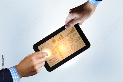 Photo: Modern computer technology in business Modern computer technology in business