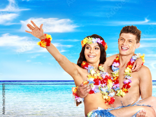 Photo: Couple with cocktail at Hawaii wreath beach. Couple with cocktail at Hawaii wreath beach.