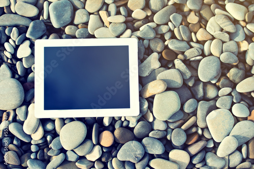 Photo: concept of internet and communication. blank tablet computer on concept of internet and communication. blank tablet computer on