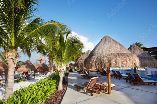 Photo: Chaise-long near swimming pool. Chaise-long near swimming pool.