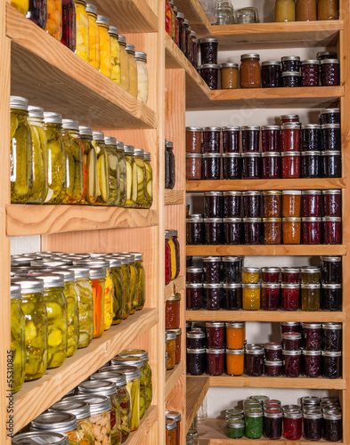 Photo: Storage shelfs with canned food Storage shelfs with canned food