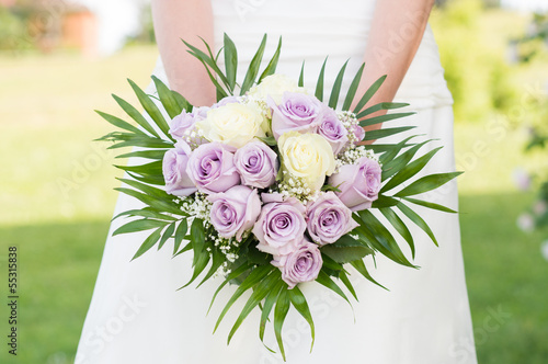 Photo: Bride Holding Rose Bouquet Bride Holding Rose Bouquet