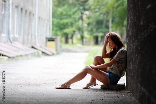 Photo: girl with problems outdoor girl with problems outdoor
