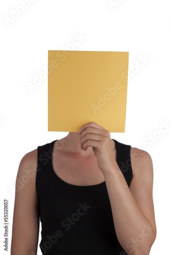 Photo: Person Hides Behind a Yellow Square Person Hides Behind a Yellow Square