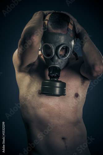 Photo: Toxic concept, nude man with gas mask Toxic concept, nude man with gas mask