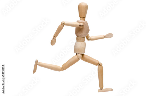 Photo: Weiss isolierte Figur aus Holz beim rennen Weiss isolierte Figur aus Holz beim rennen