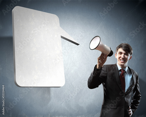 Photo: businessman with megaphone businessman with megaphone