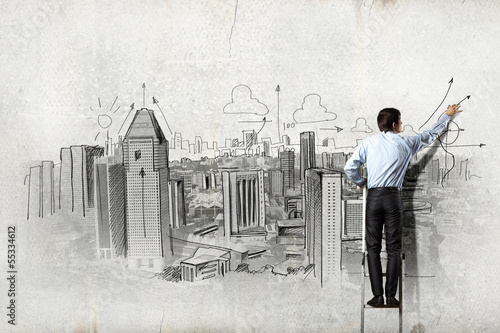 Photo: Businessman drawing sketch Businessman drawing sketch