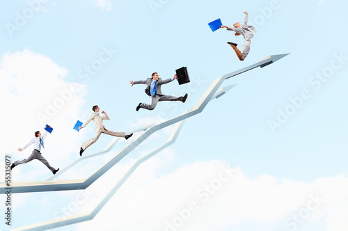 Photo: Businesspeople jumping Businesspeople jumping