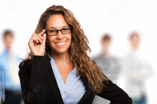 Photo: Woman holding her eyeglasses Woman holding her eyeglasses