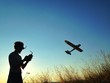 man playing with rc airplane man playing with rc airplane