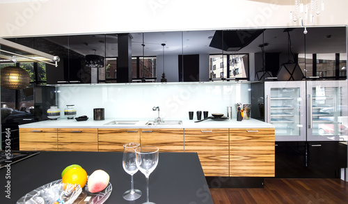 Photo: nice interior with furniture and kitchen appliances nice interior with furniture and kitchen appliances