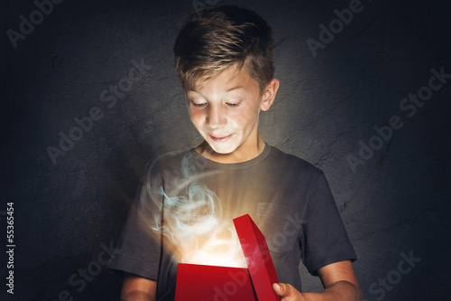 Photo: Child with Present Child with Present