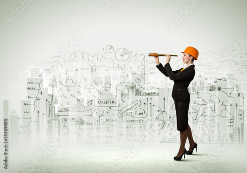 Photo: Woman engineer with scope Woman engineer with scope