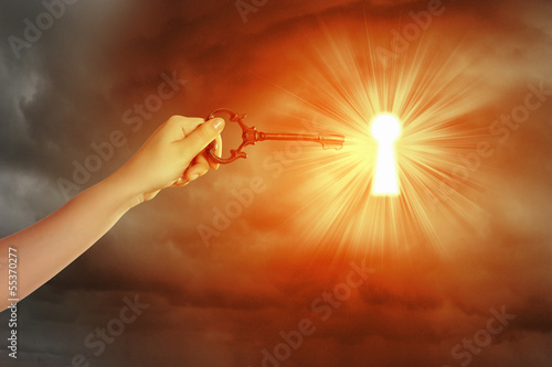 Photo: Hand with key Hand with key