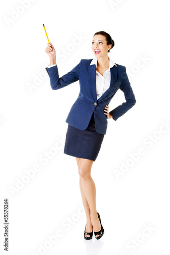 Photo: Attractive happy businesswoman with pen Attractive happy businesswoman with pen