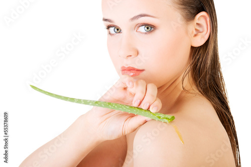 Photo: Woman with aloe vera Woman with aloe vera