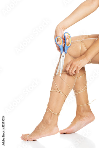 Photo: Legs tied with rope Legs tied with rope