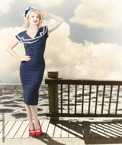 Photo: Fine art vintage pin-up. Vacation departure dock Fine art vintage pin-up. Vacation departure dock