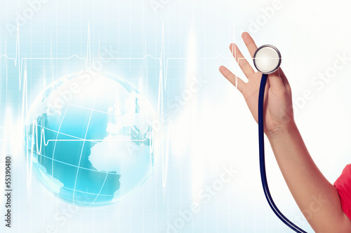 Photo: Doctor's hand with stethoscope Doctor's hand with stethoscope
