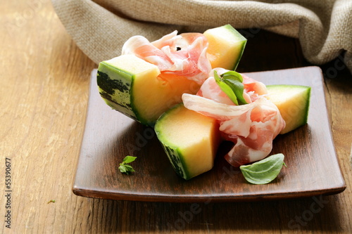 Photo: Italian antipasti melon with smoked ham (prosciutto melone) Italian antipasti melon with smoked ham (prosciutto melone)